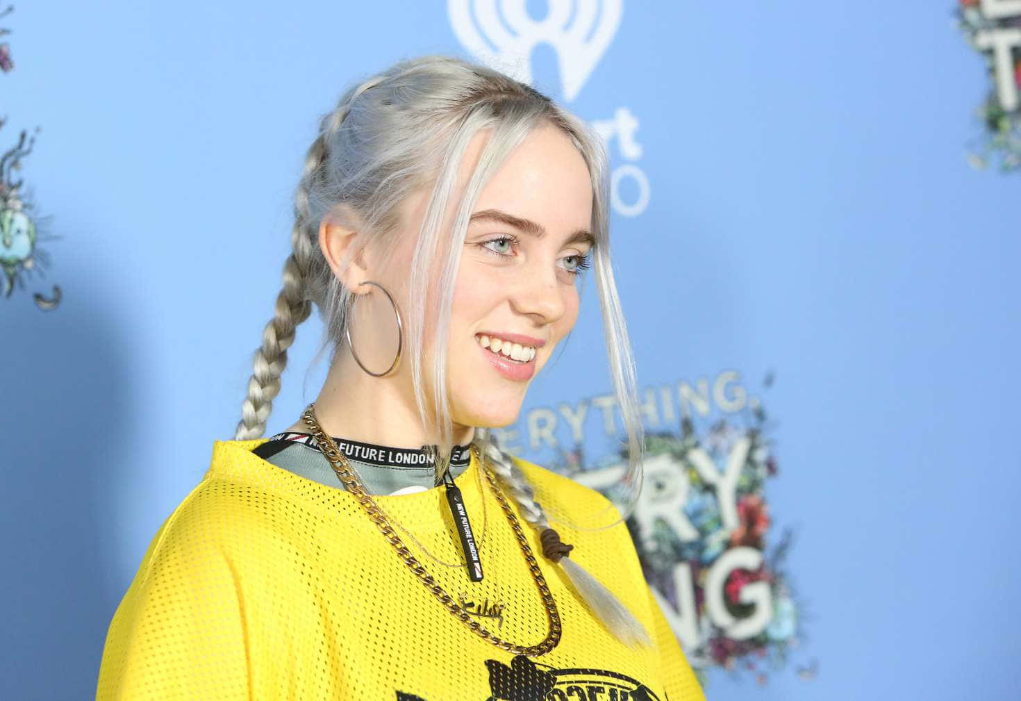 Billie Eilish Positively Radiates In Her Dazzling Smile Wallpaper