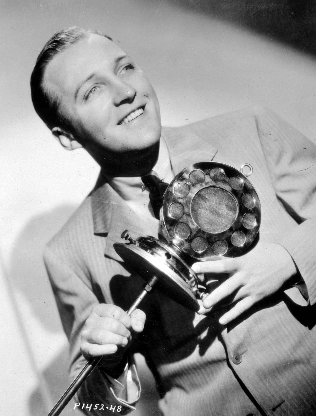 Bing Crosby Holding A Metal Staff Wallpaper