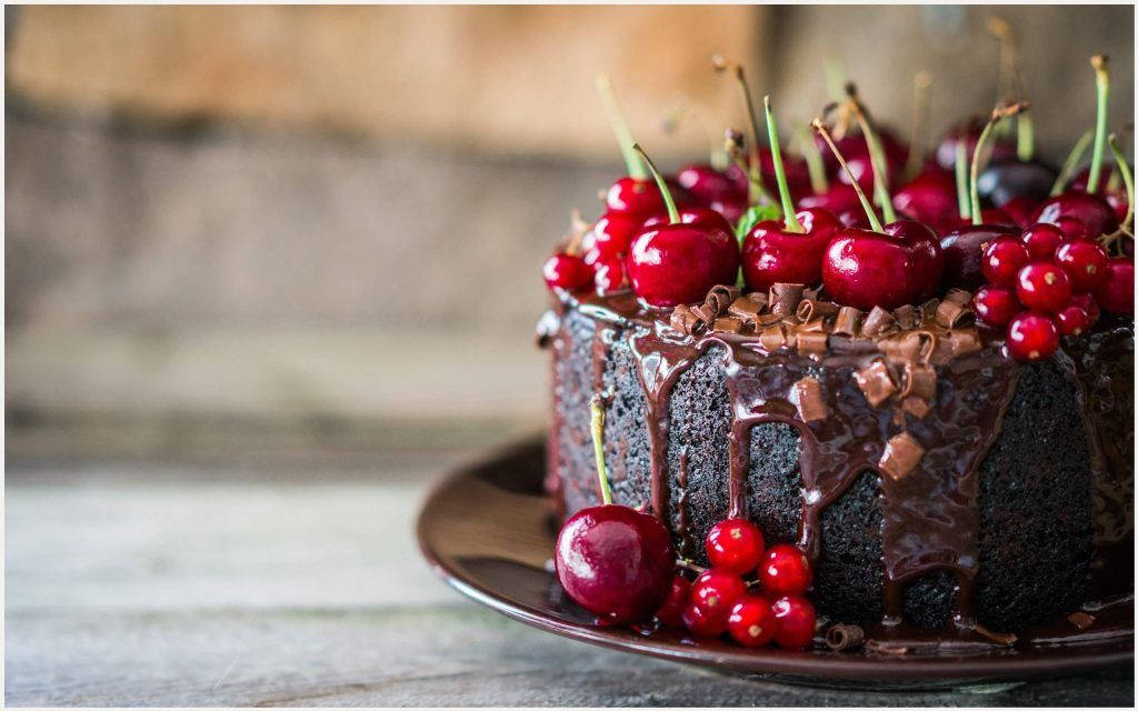 Birthday Cake Topped With Cherries Wallpaper