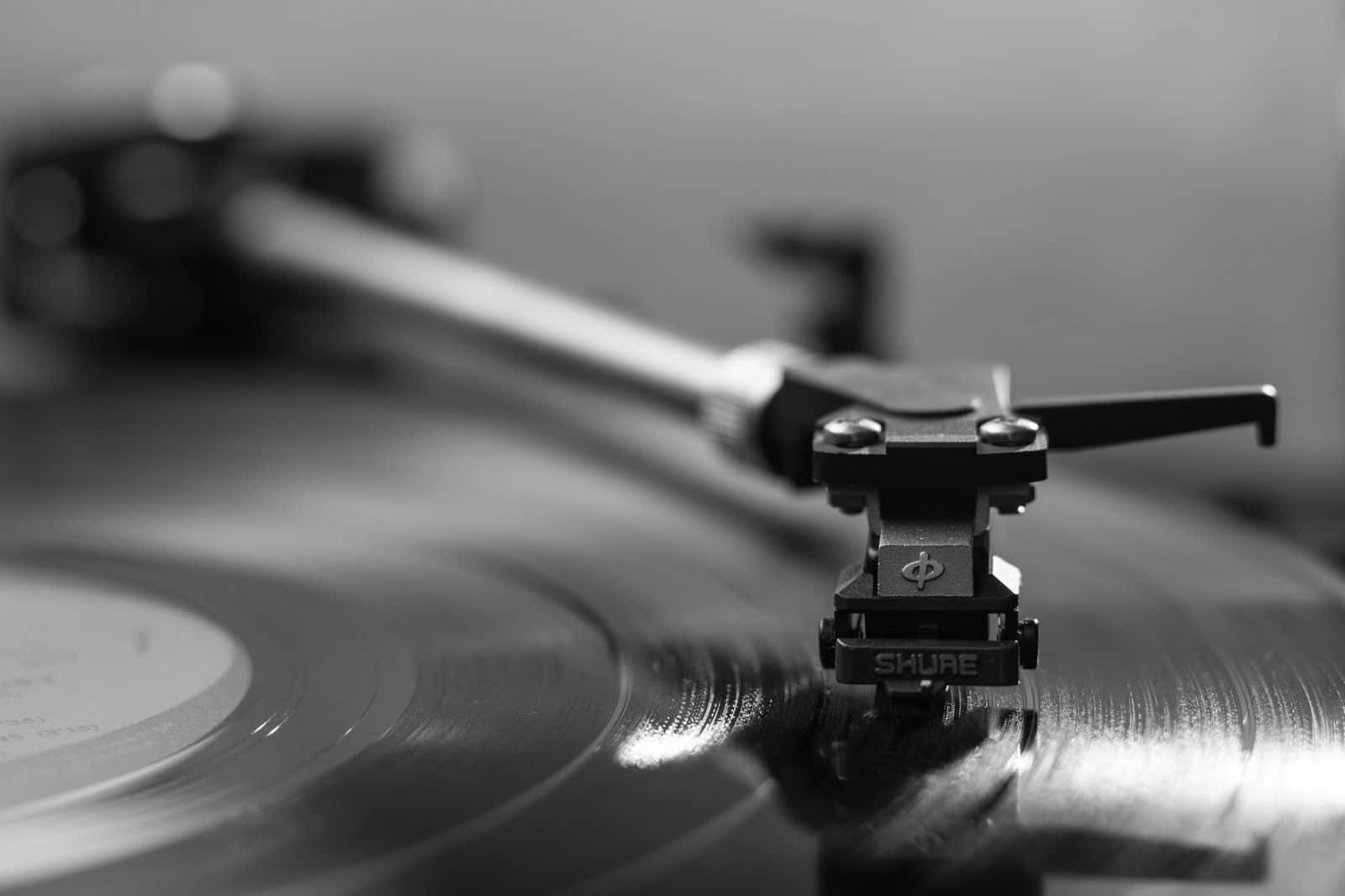 Black And White Music Concept With Piano Keys And Blurred Note Backdrop Wallpaper