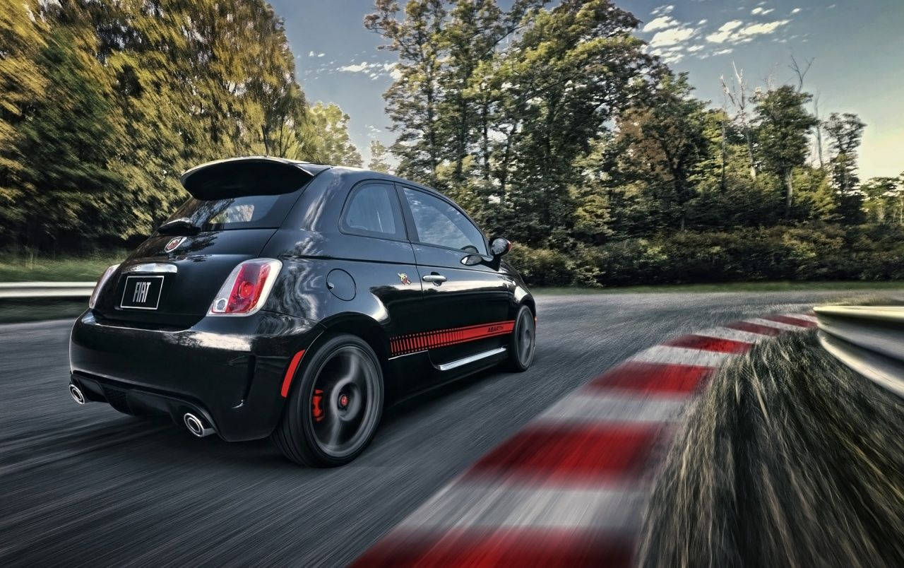 Black Fiat 500 Abarth In Motion Wallpaper