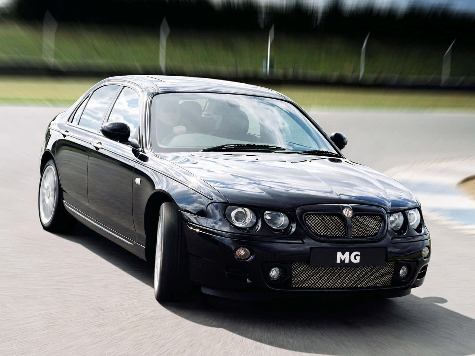 Black M G Sports Sedan Motion Blur Wallpaper