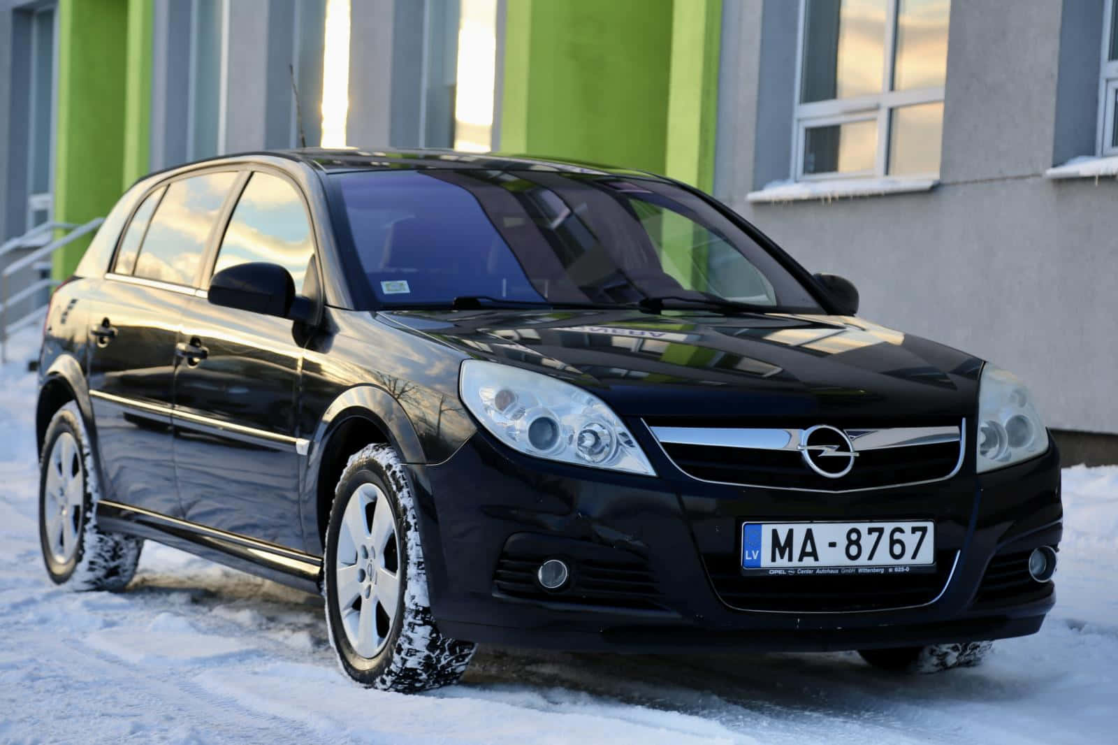 Black Opel Signum Winter Scene Wallpaper