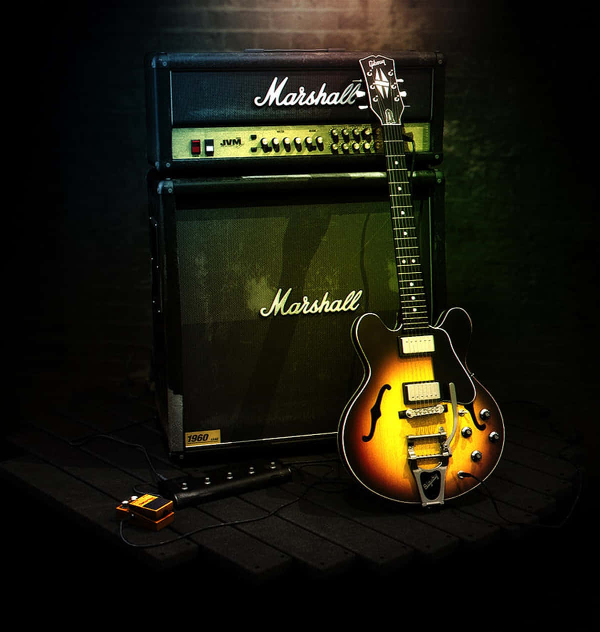 Black Orange Gibson 335 With Amplifier Wallpaper