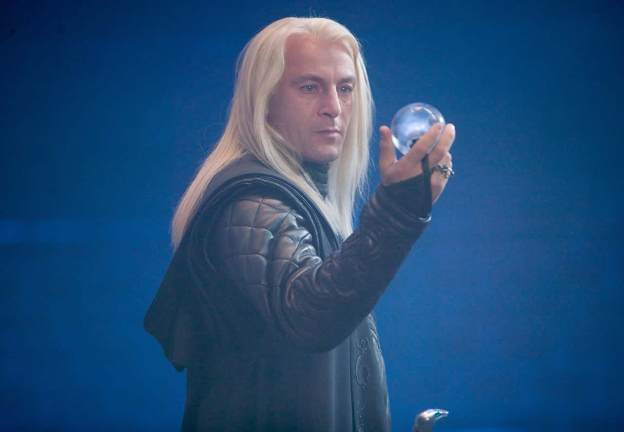 Blonde Man Holding Crystal Ball Wallpaper