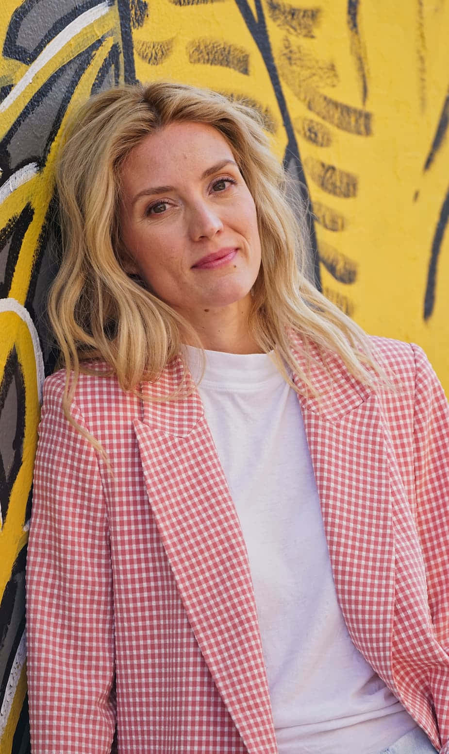 Blonde Womanin Pink Checkered Blazer Wallpaper