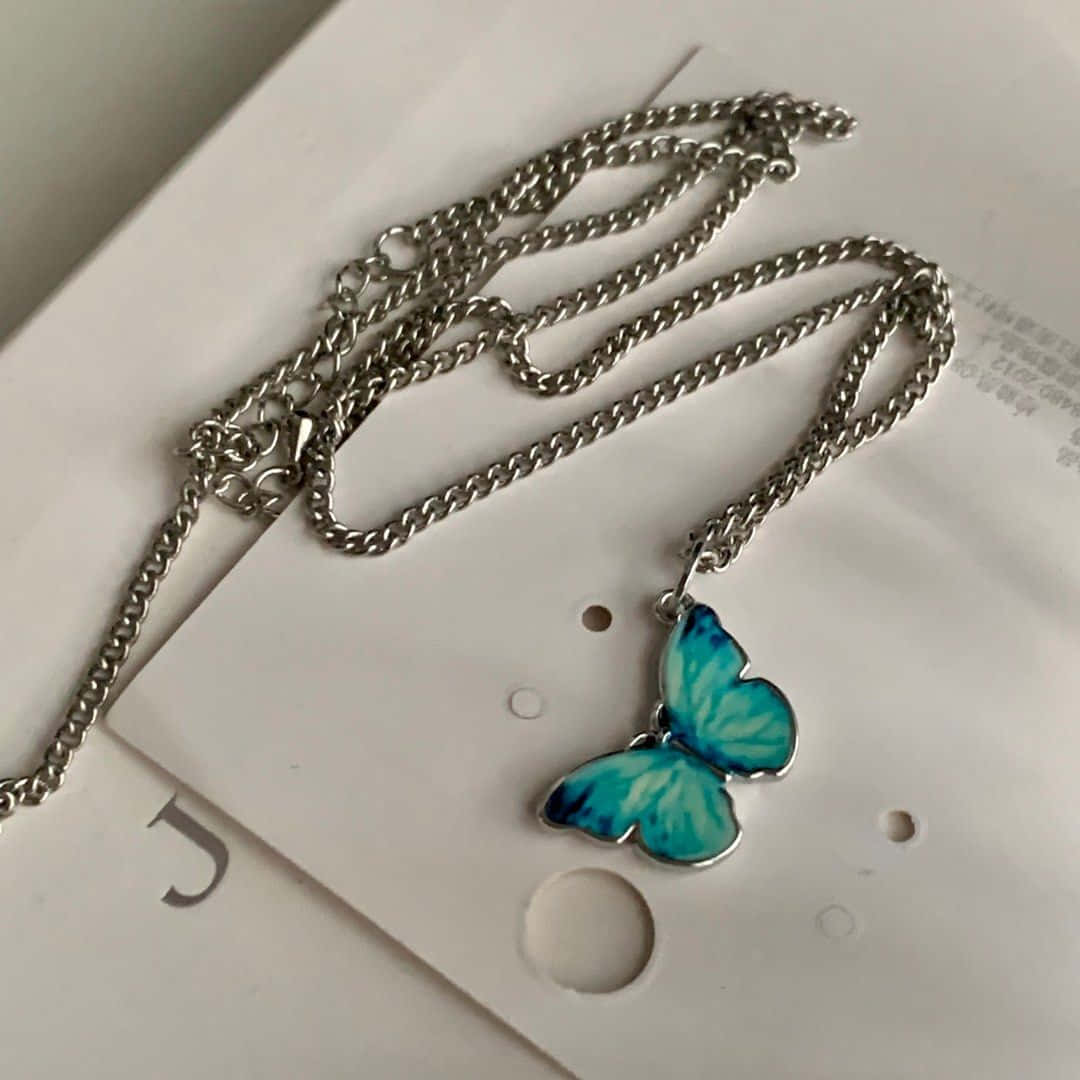 Blue Butterfly Pendant Necklace Wallpaper