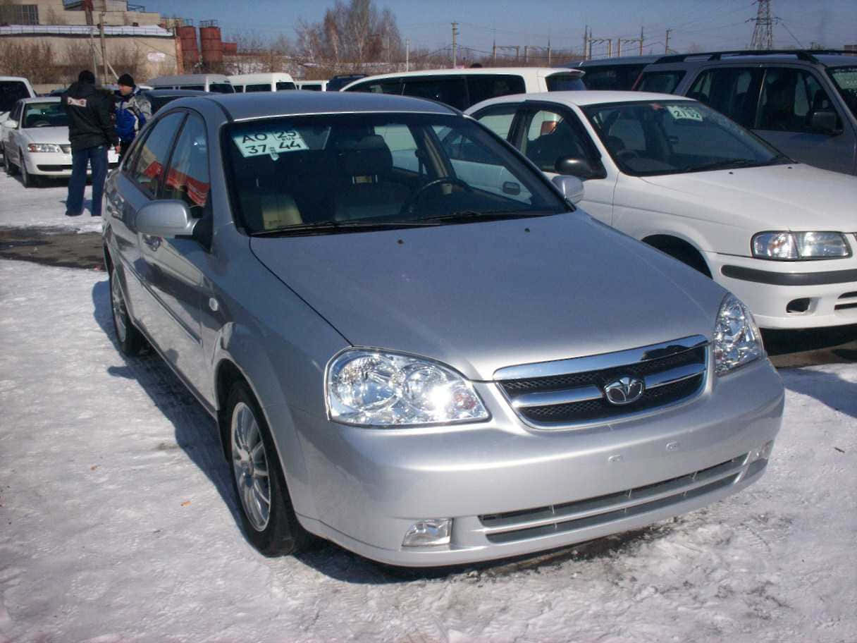 Blue Daewoo Lacetti Parked On A City Street Wallpaper