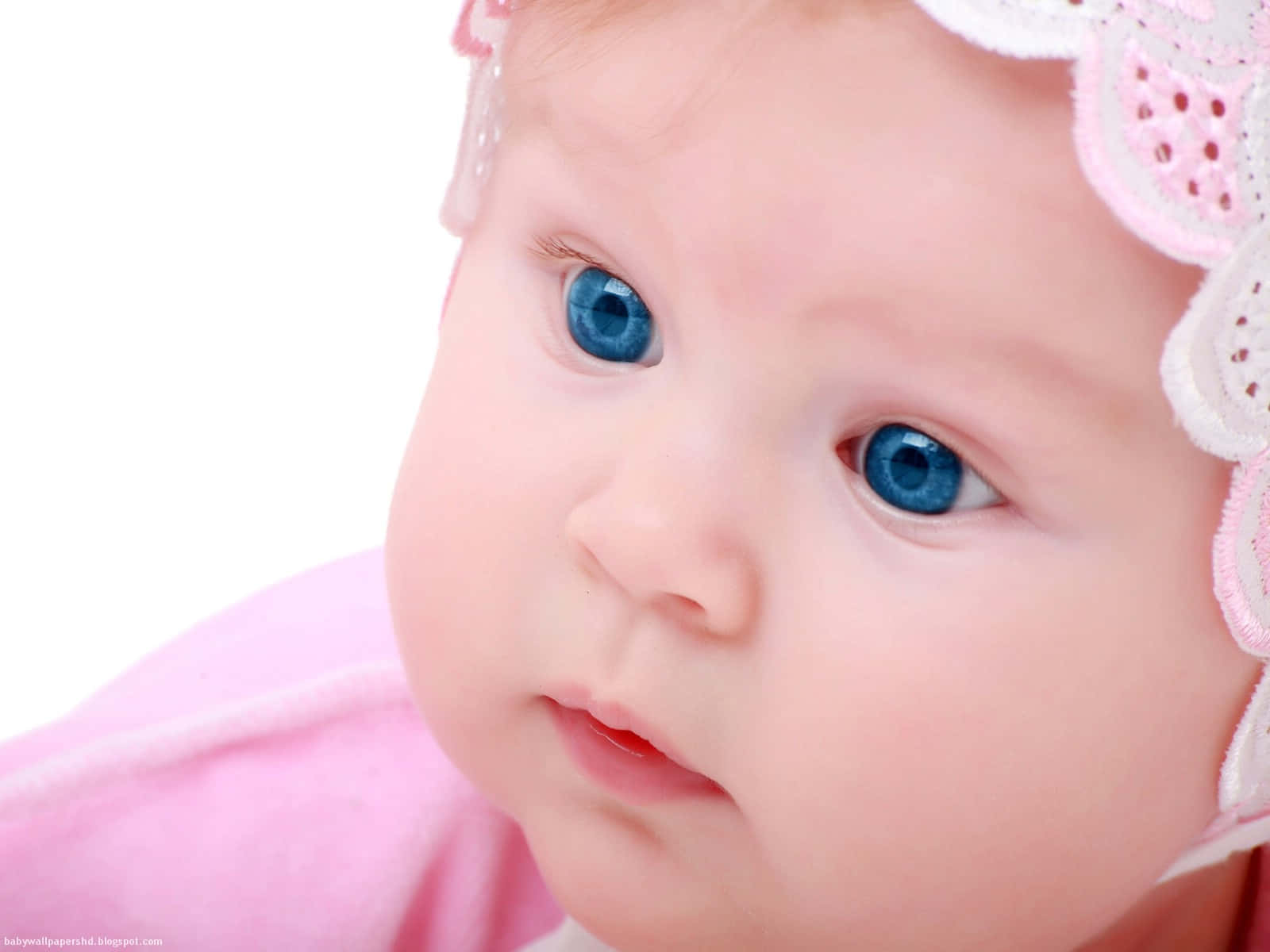 Blue Eyed Babyin Pink Bonnet Wallpaper