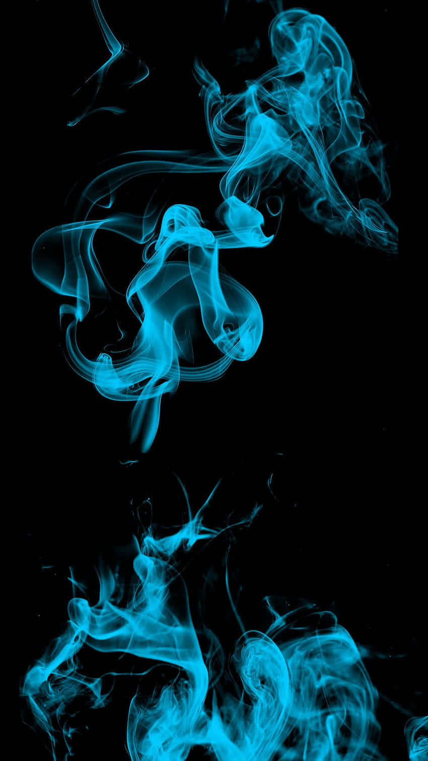 Blue Flames Captured In A Handy Manner Wallpaper