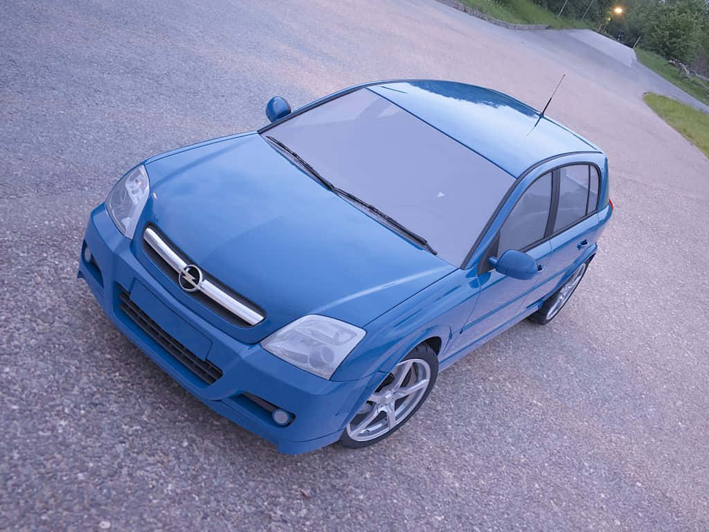 Blue Opel Signum Aerial View Wallpaper