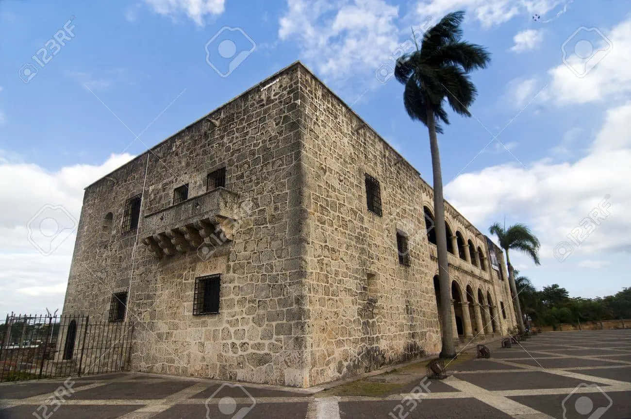 Blue Skies Behind Alcazar De Colon Wallpaper