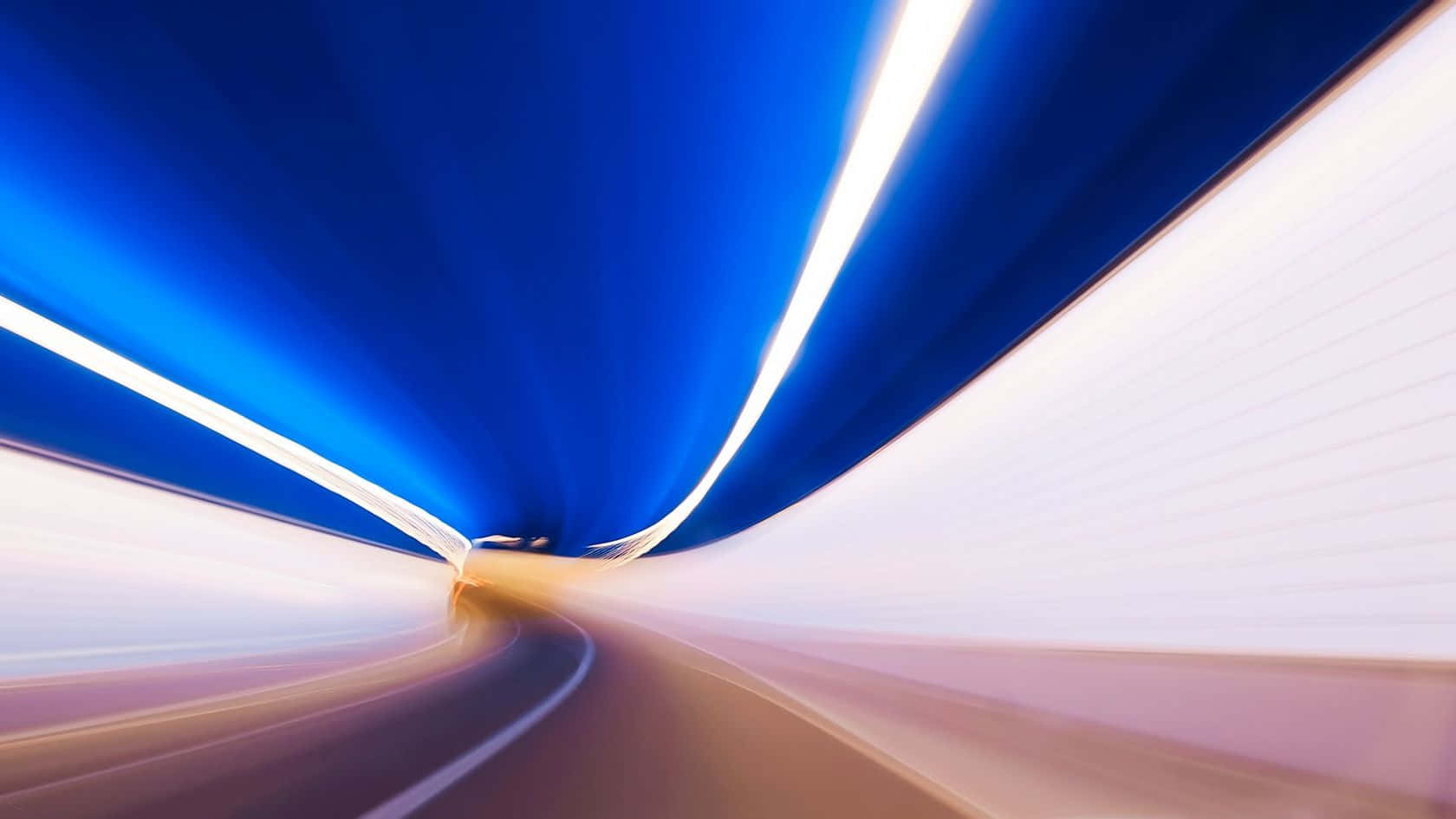 Blue Streak Blur On An Asphalt Road Wallpaper