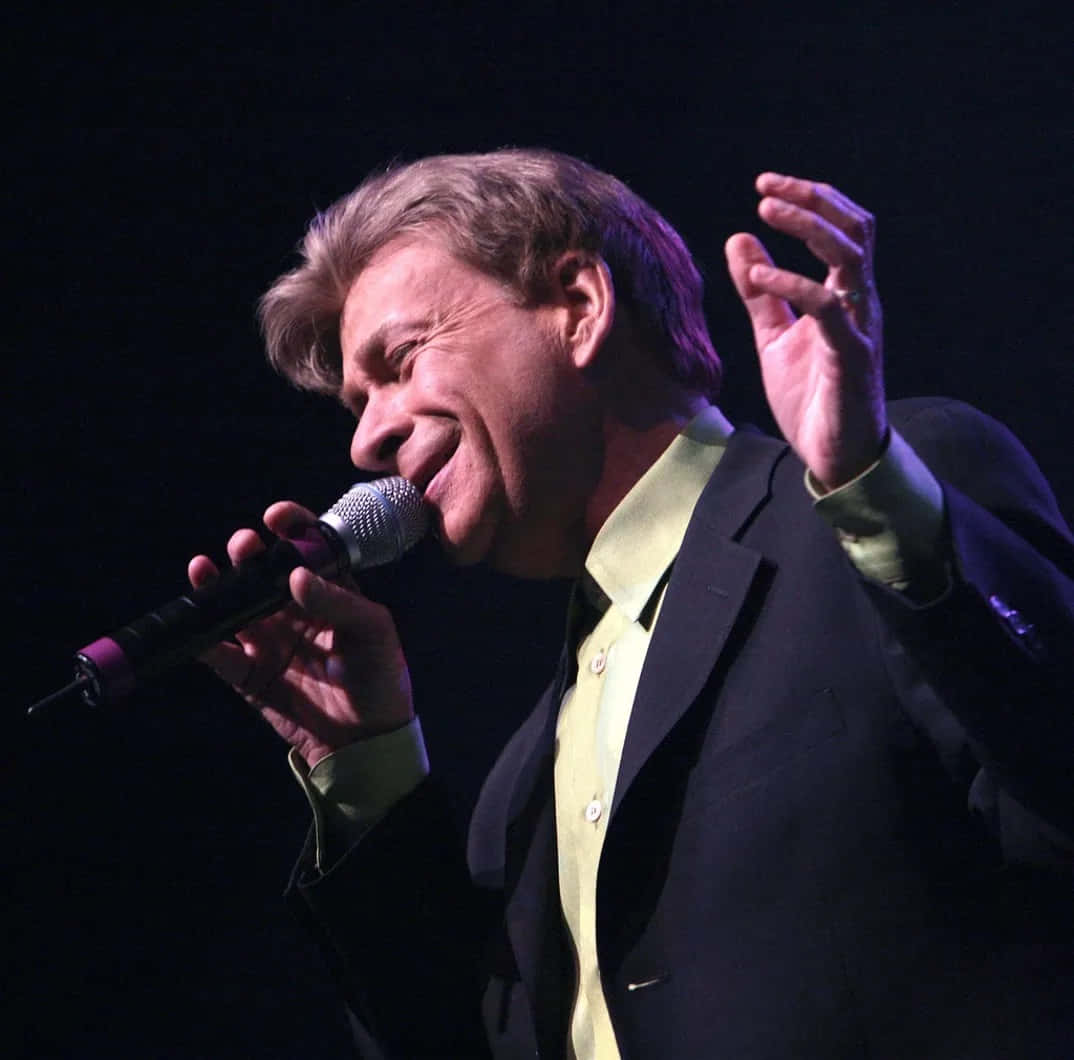 Bobby Caldwell Performing Live On Stage Wallpaper