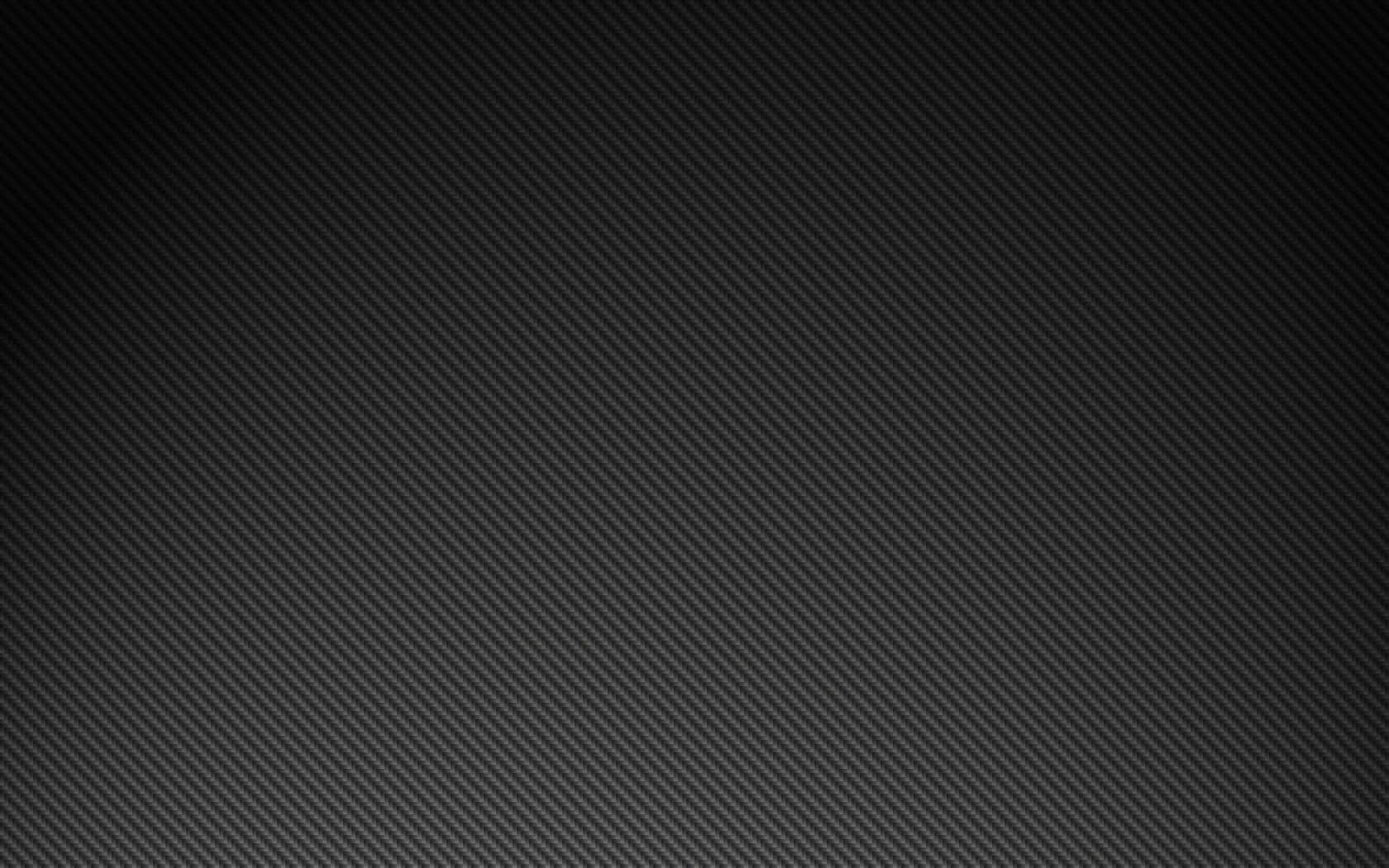 Bold And Stylish Black Carbon Fiber Wallpaper