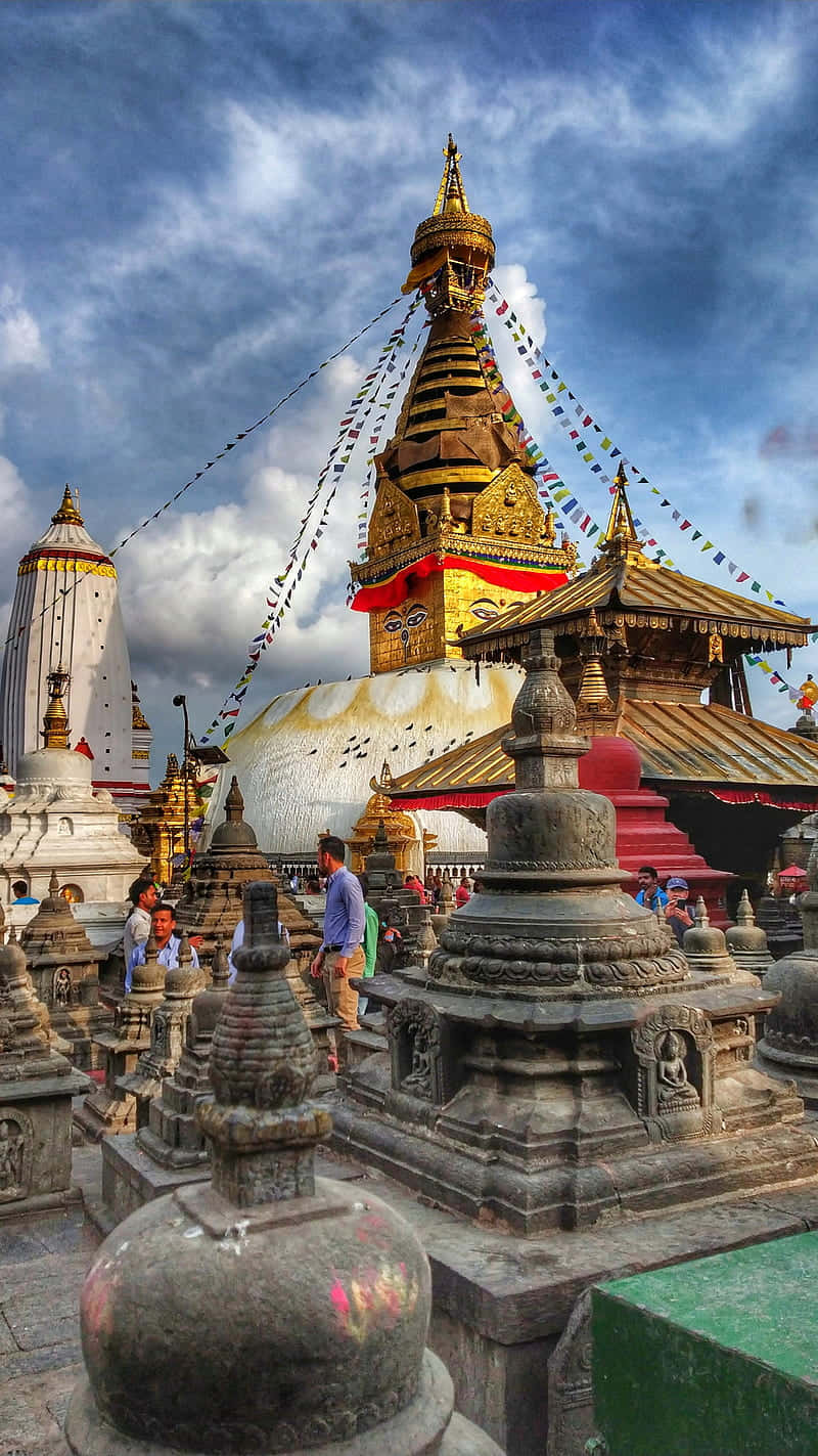 Boudhanath Stupa And Mini Stone Stupas Wallpaper