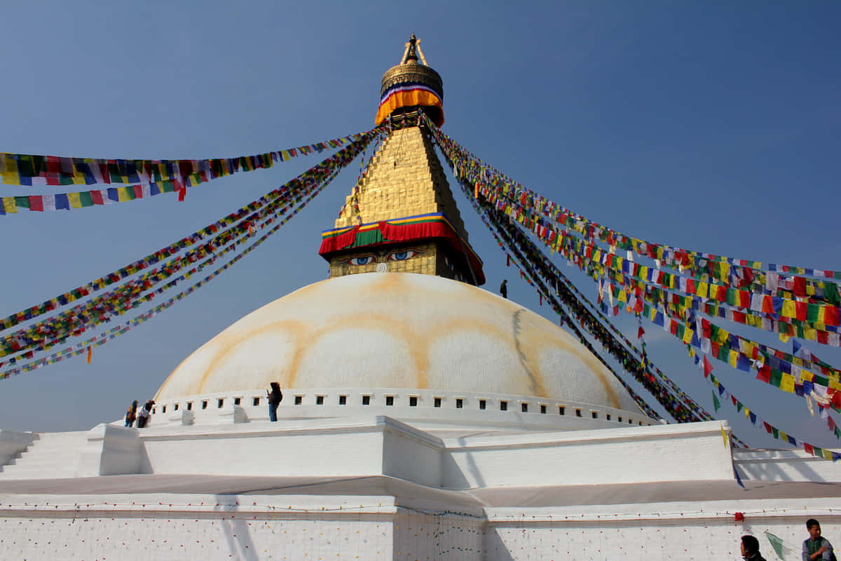 Boudhanath Stupa Vase And Statues Wallpaper