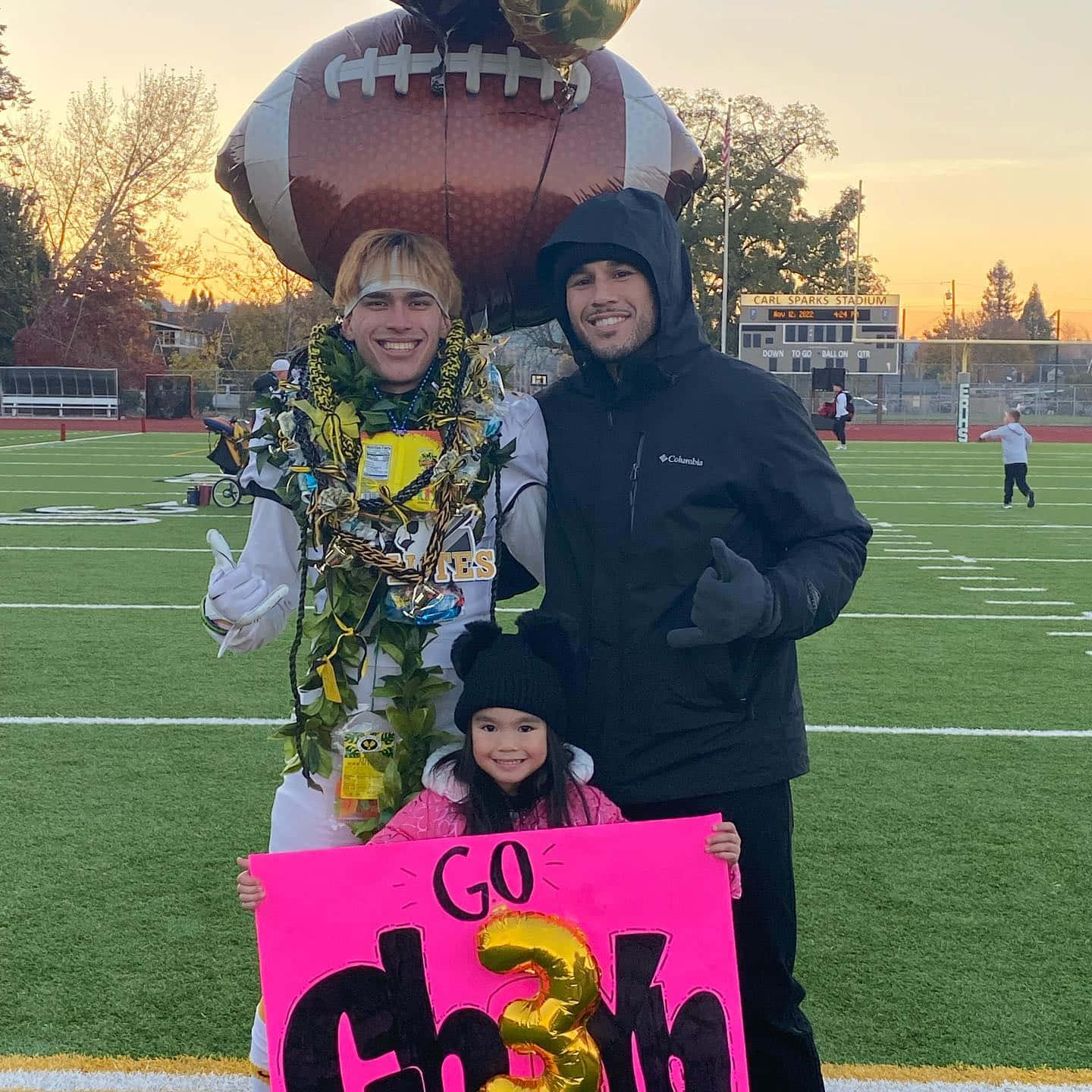 Brad Tavares With His Family At A Game Wallpaper