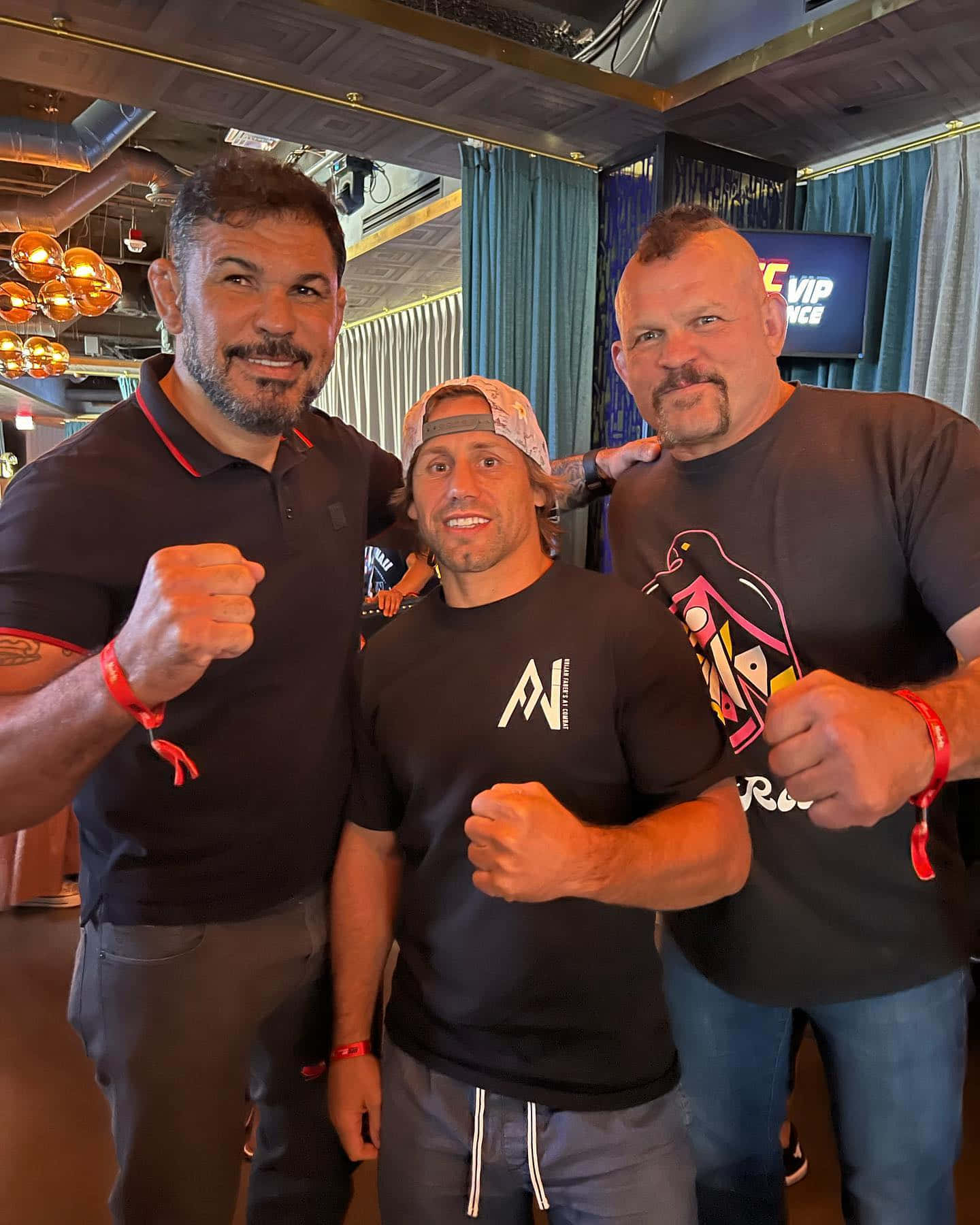 Brazilian Mixed Martial Artist Antônio Rodrigo Nogueira Posing For A Photo With Fans Wallpaper