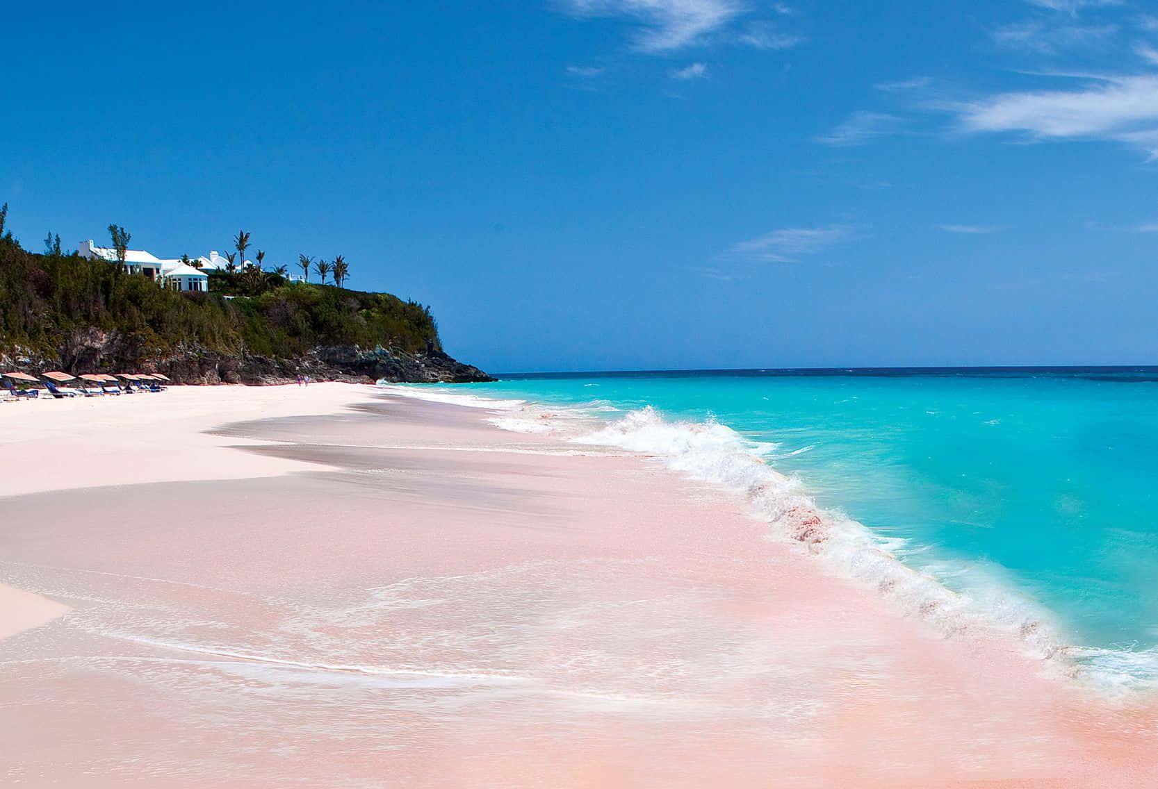 Breathtaking Pink Sand Beach At Sunset Wallpaper