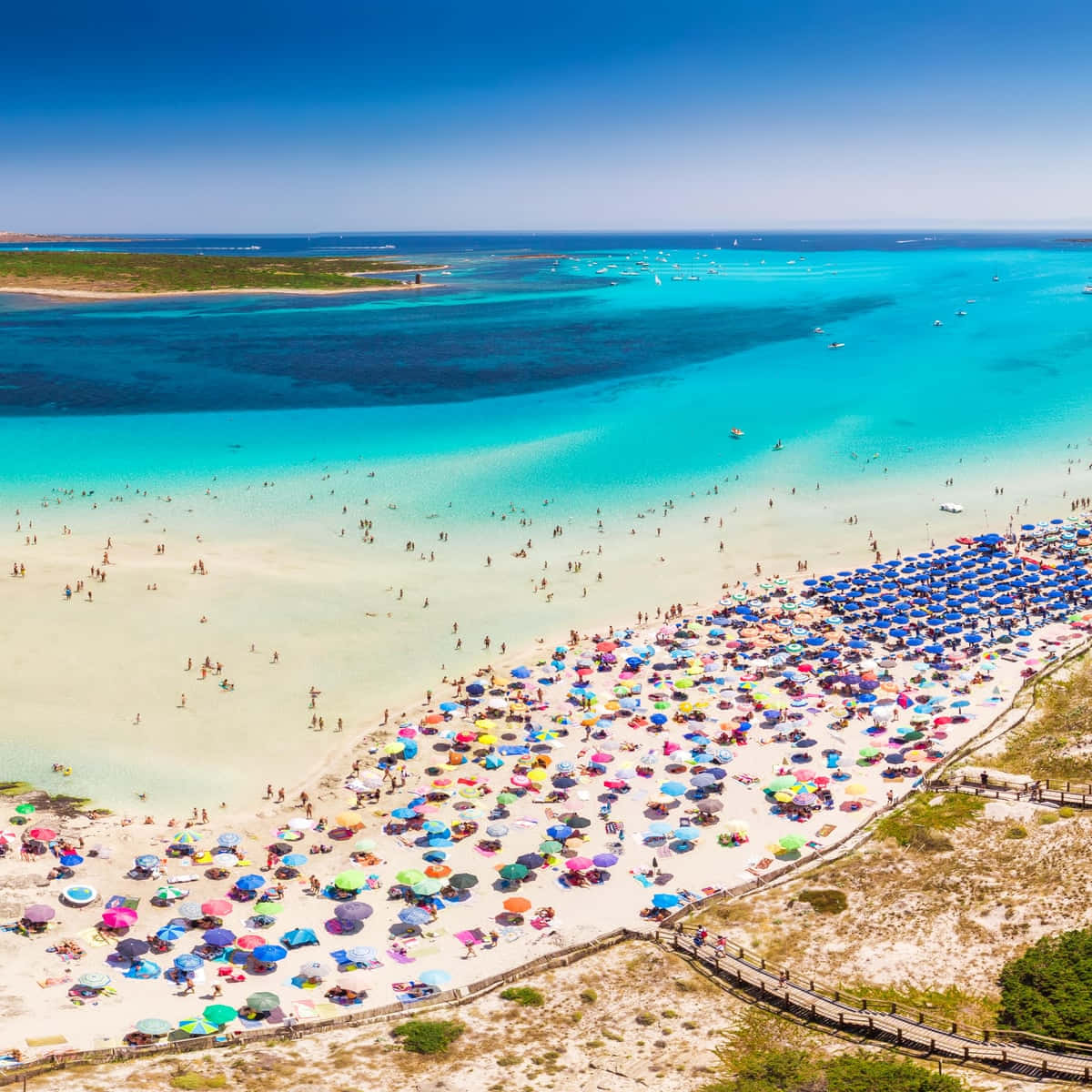 Breathtaking View Of A Pristine Italian Beach Wallpaper