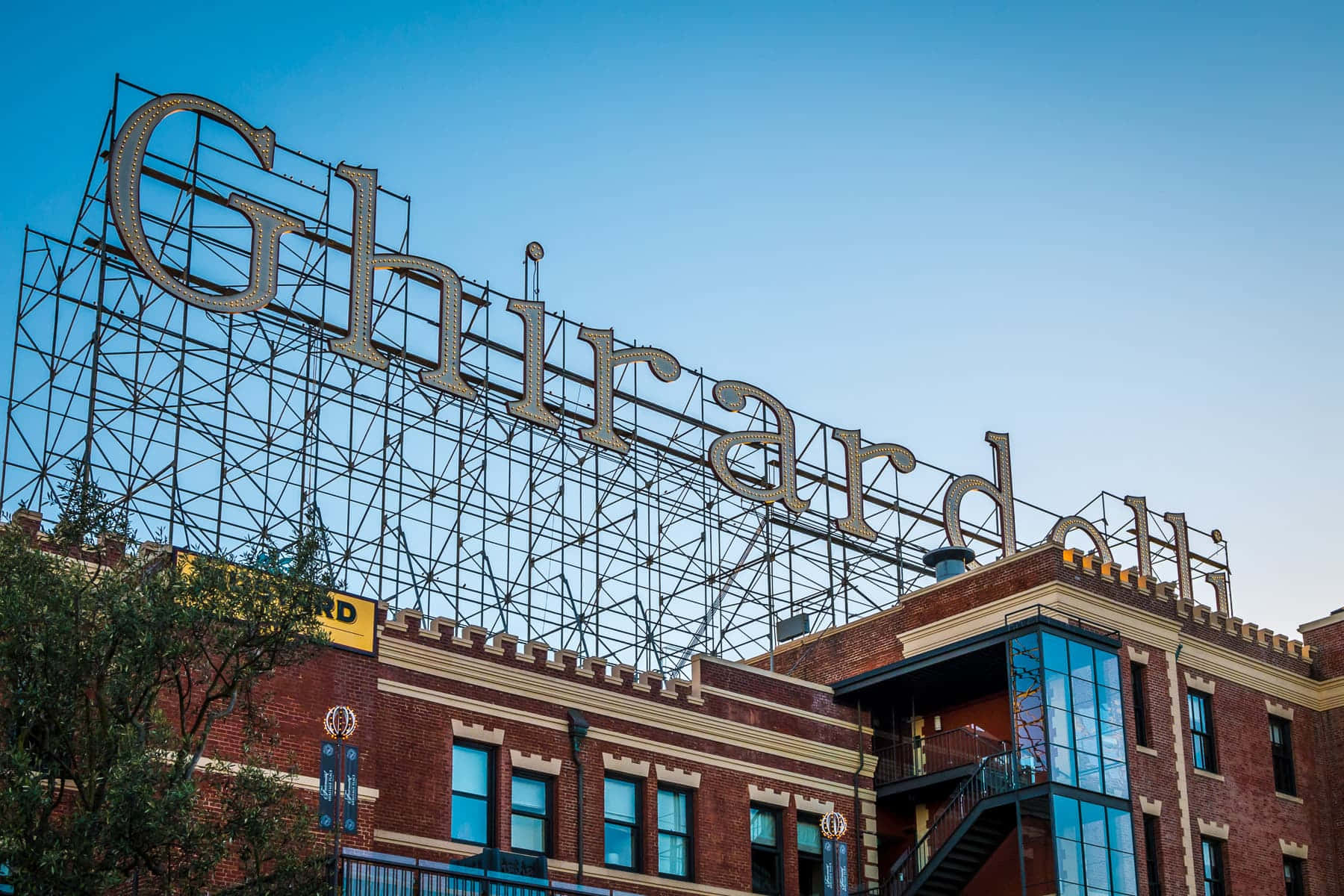 Breathtaking View Of Ghirardelli Square Atop A Classic Brick Building Wallpaper