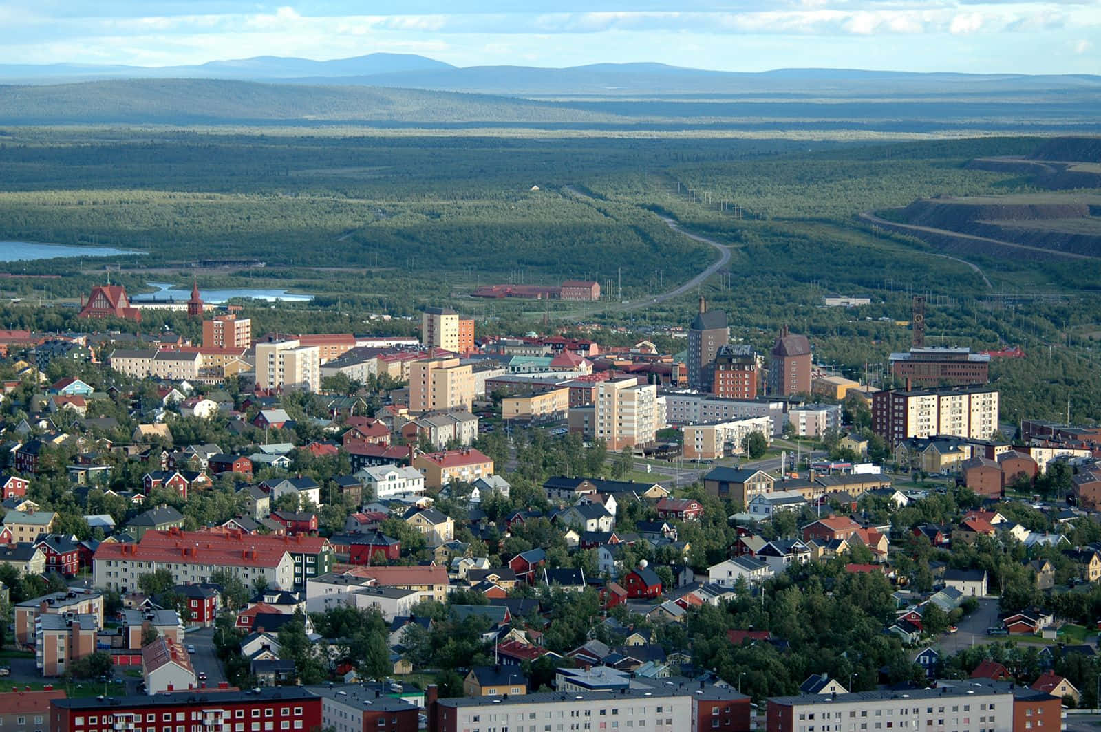 Breathtaking View Of Kiruna Under The Northern Lights Wallpaper