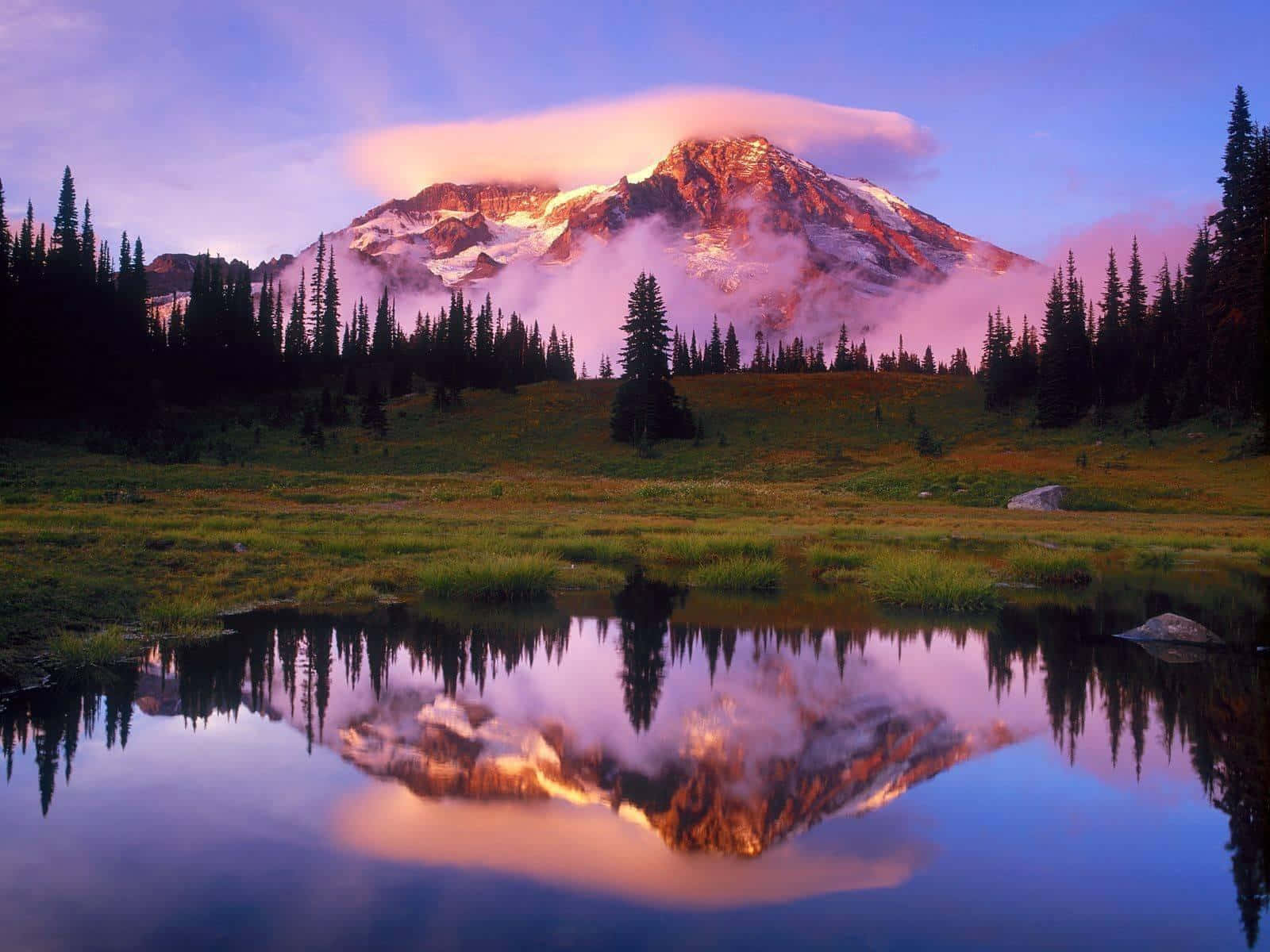 Breathtaking View Of The Beautiful Mountain At Sunset Wallpaper