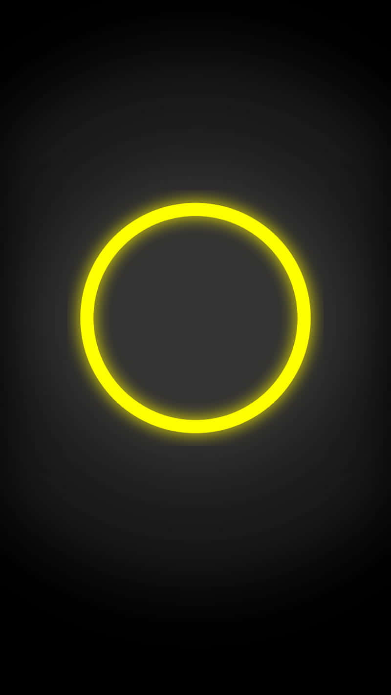 Bright, Vibrant Yellow Neon Light In A Dark Space Wallpaper