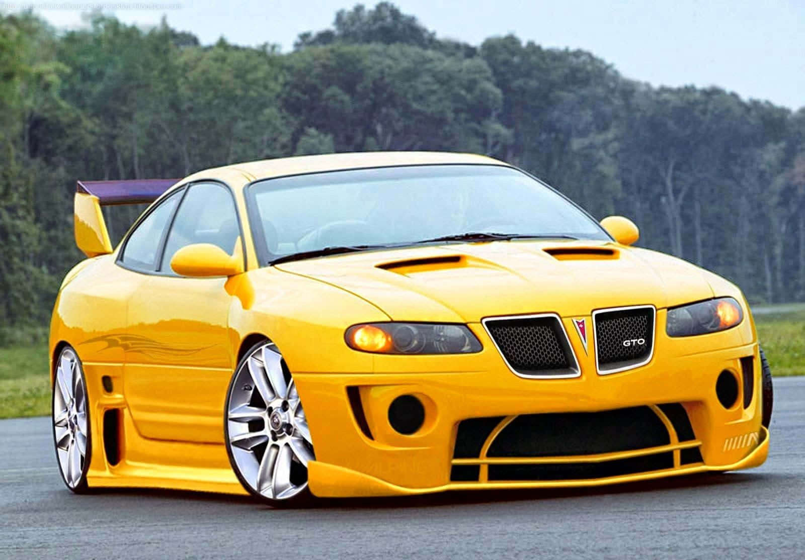 Bright Yellow Sports Car At The Beach Wallpaper