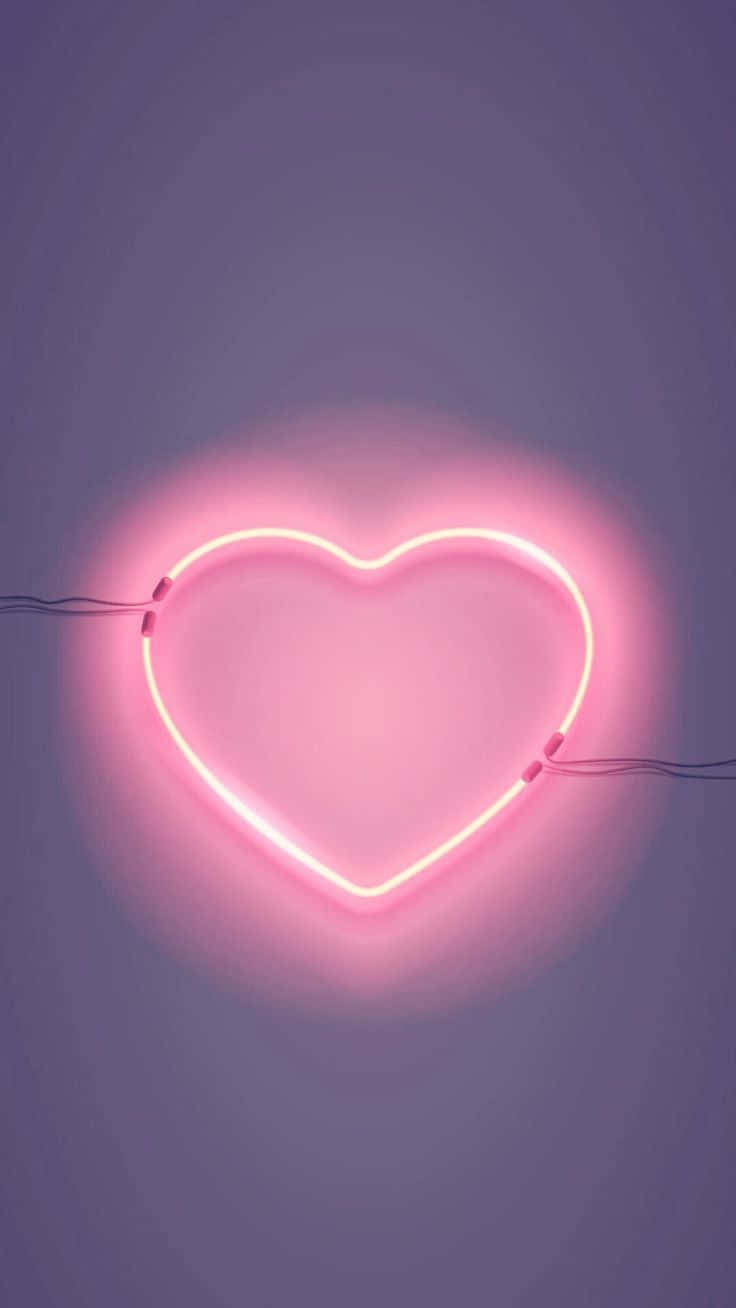 Brighten Up Your Life With An Electrifying Neon Heart! Wallpaper