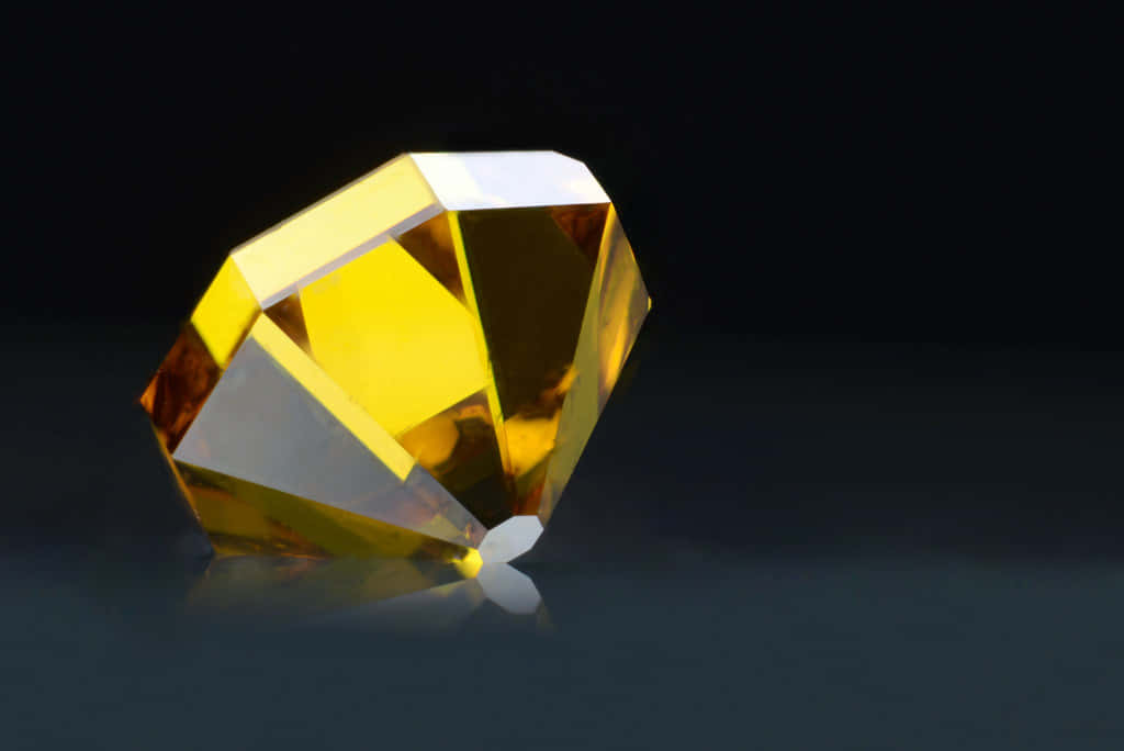 Brilliant Yellow Diamond In Close-up Wallpaper