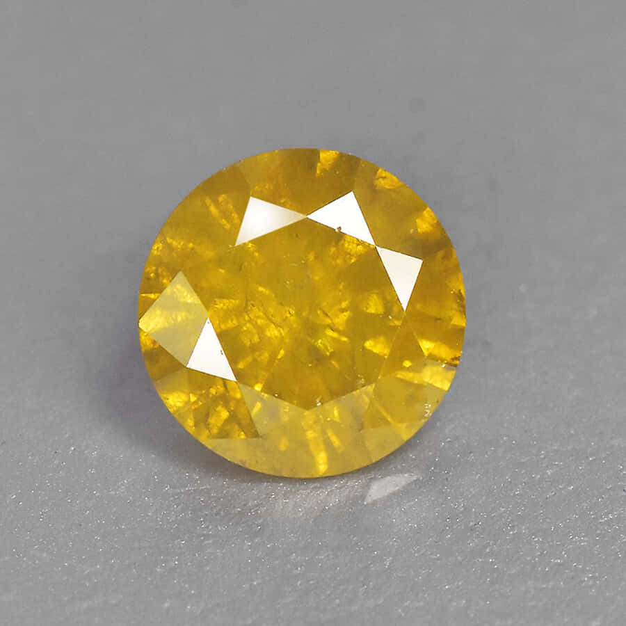 Brilliant Yellow Diamond Sparkling In The Light Wallpaper