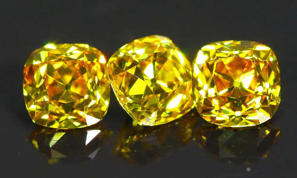 Brilliant Yellow Diamond Sparkling In The Light Wallpaper