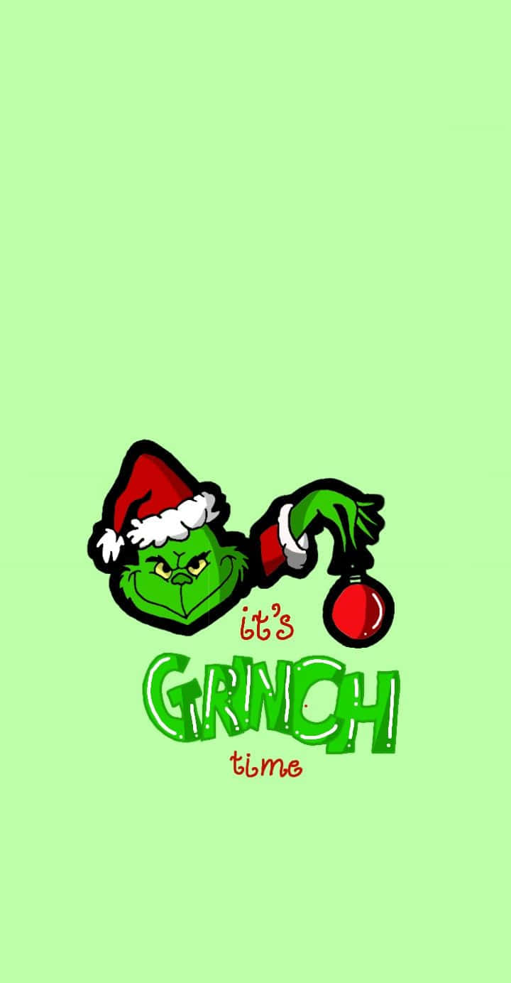 Bring On The Christmas Cheer With A Cute Grinch Wallpaper