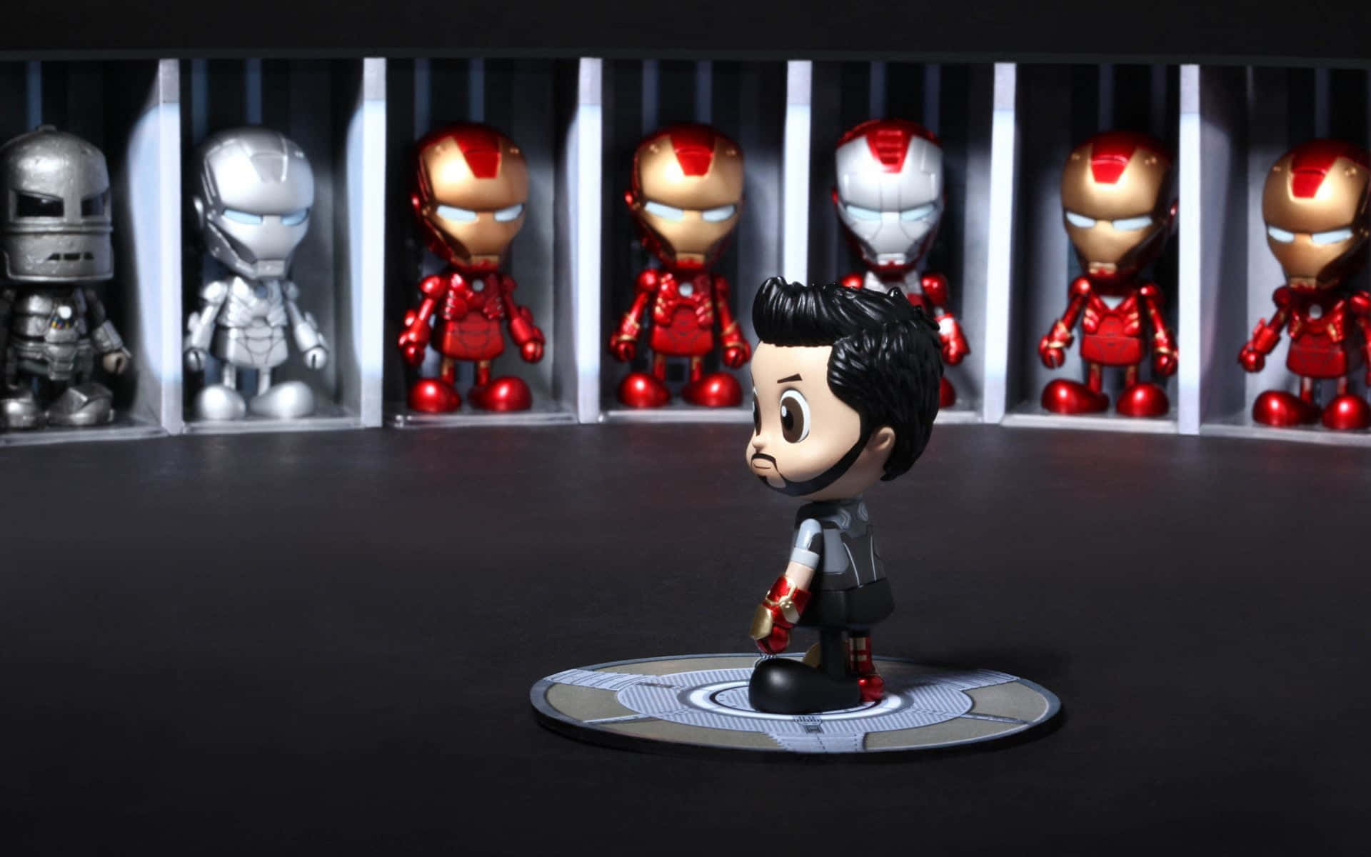 Bring The Marvel Cinematic Universe To Life With Iron Man Action Figures Wallpaper