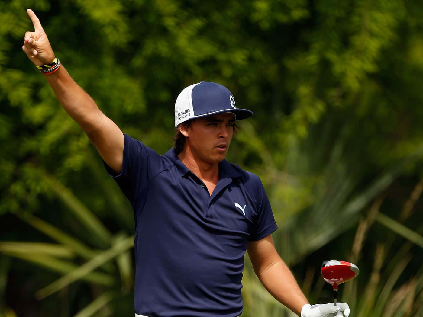 Briny Baird Showing His Perfect Golf Swing Under The Beautiful Sky Wallpaper