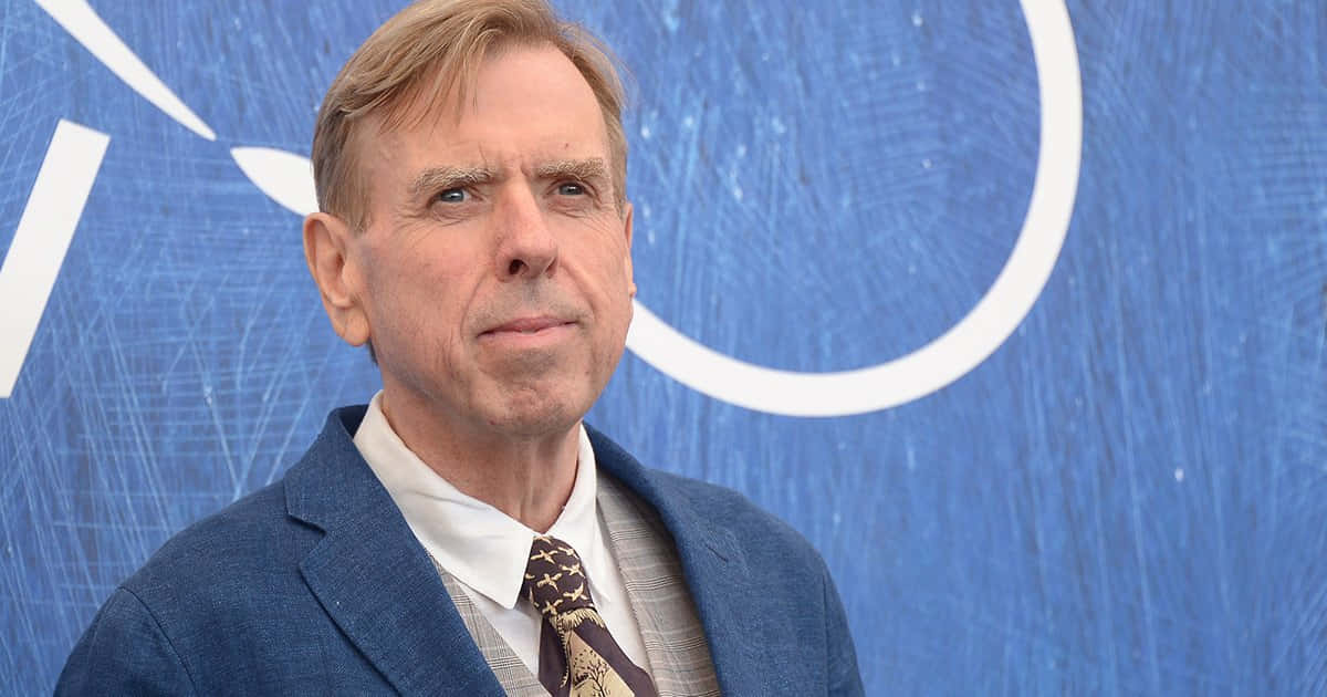 British Actor Timothy Spall Smiling For A Photoshoot Wallpaper