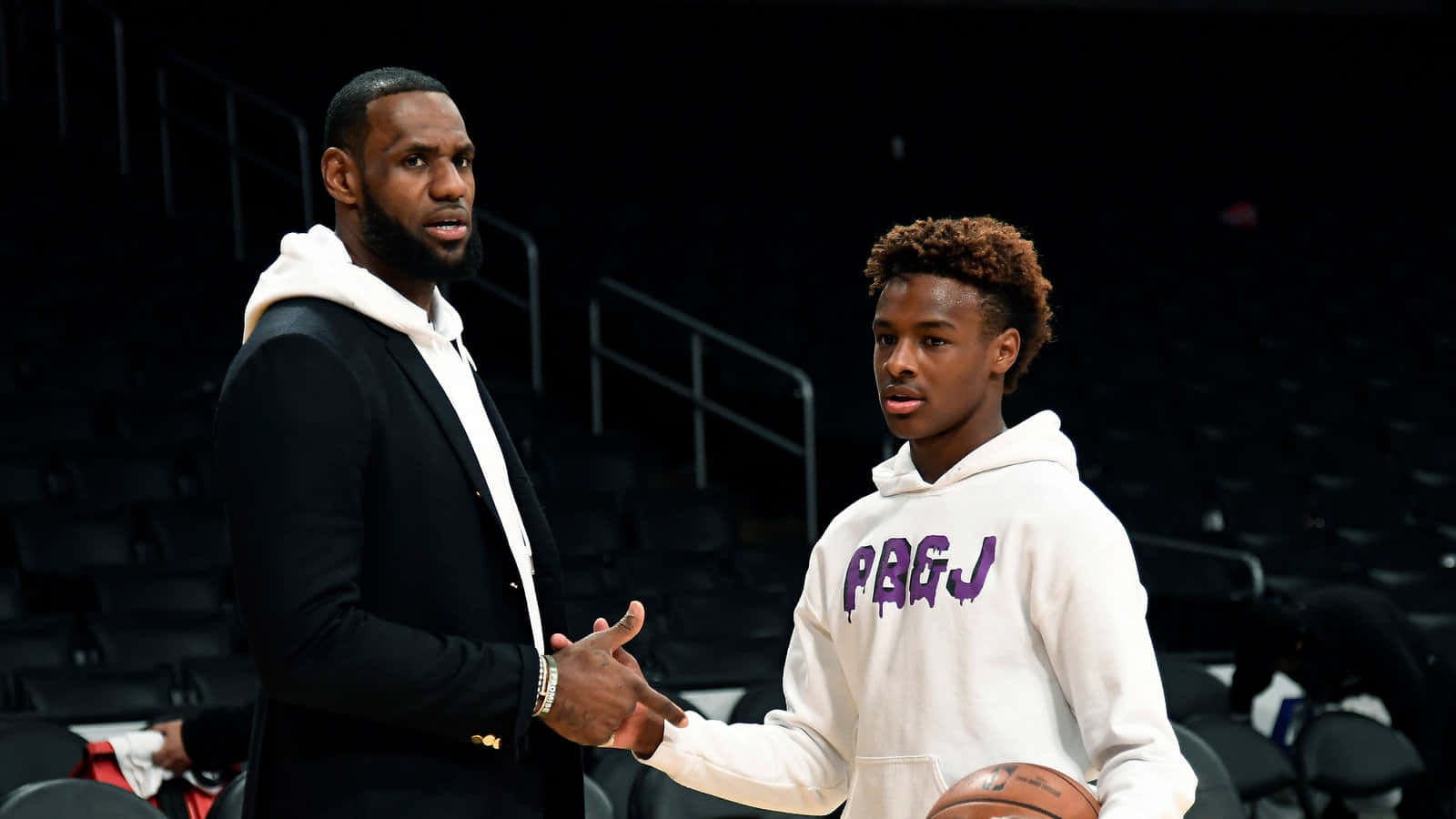 Bronny James And Lebron James Shaking Hands Wallpaper