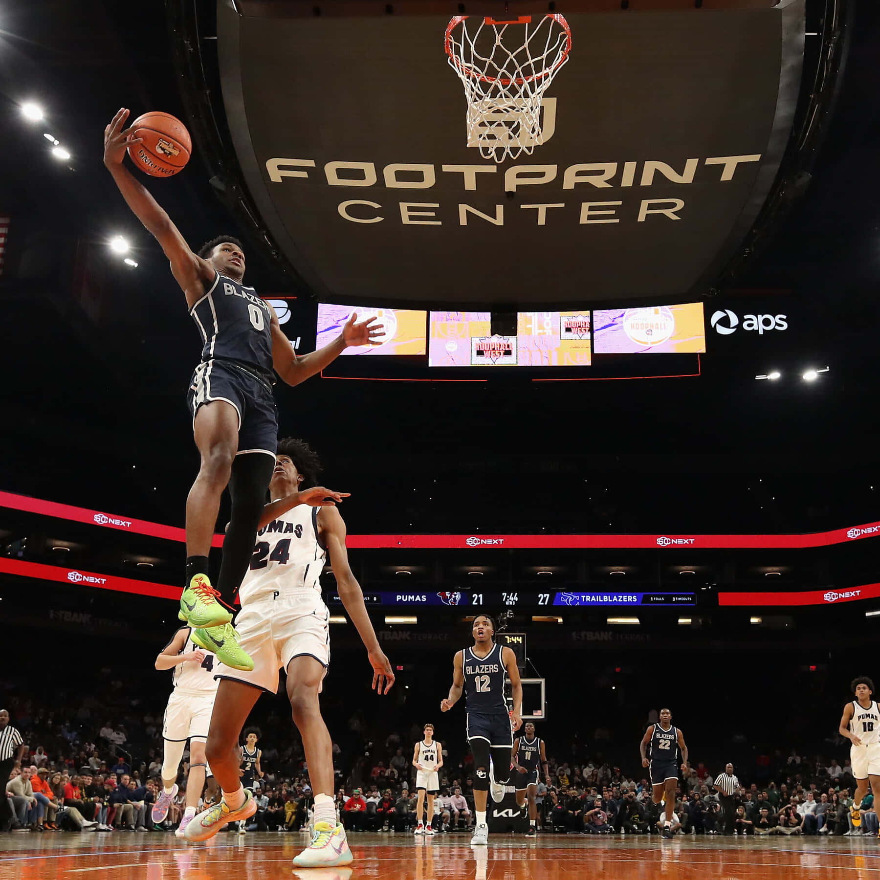 Bronny James Soaring To Victory On The Court Wallpaper