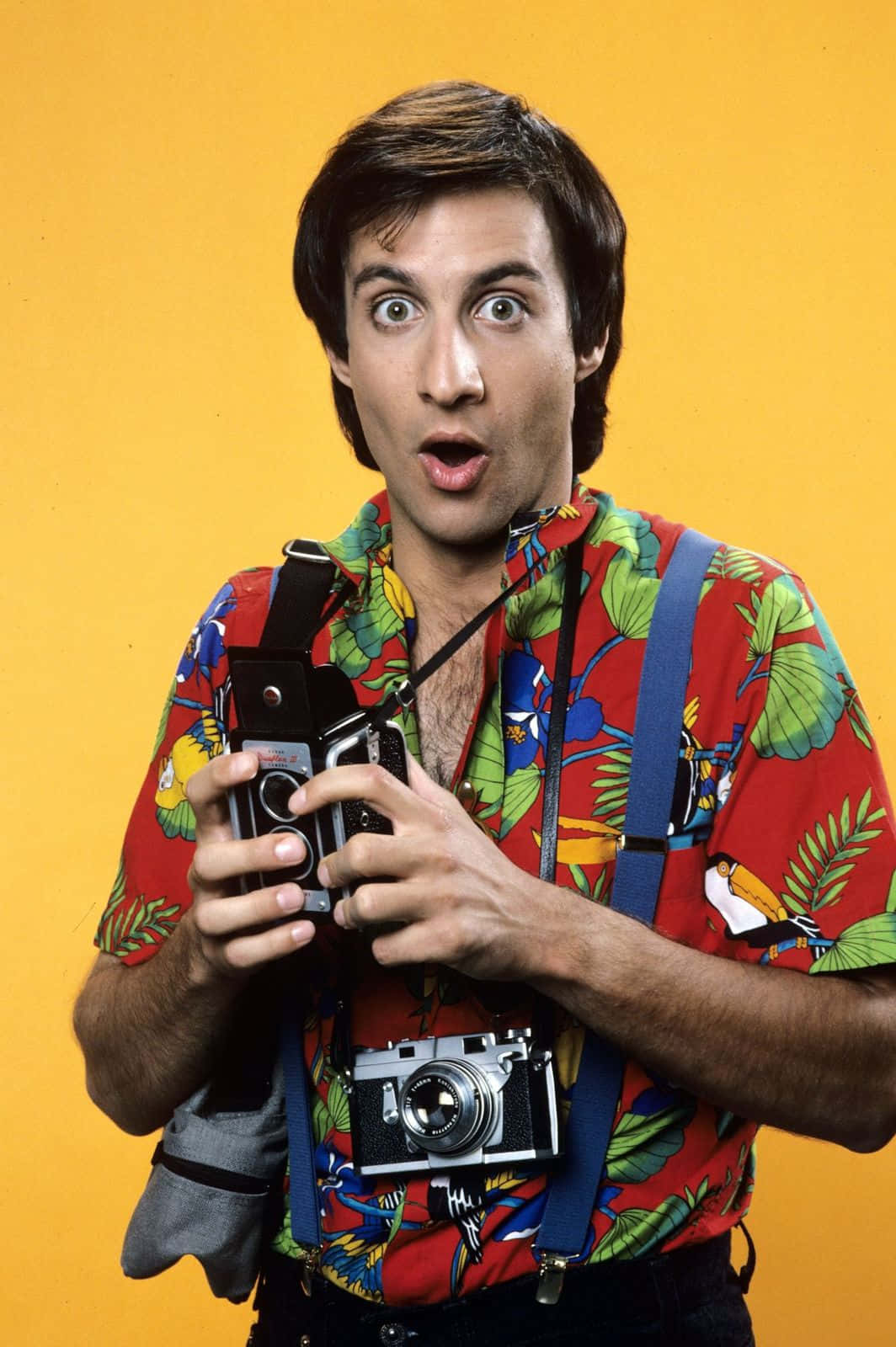 Bronson Pinchot Posing With A Smile Wallpaper