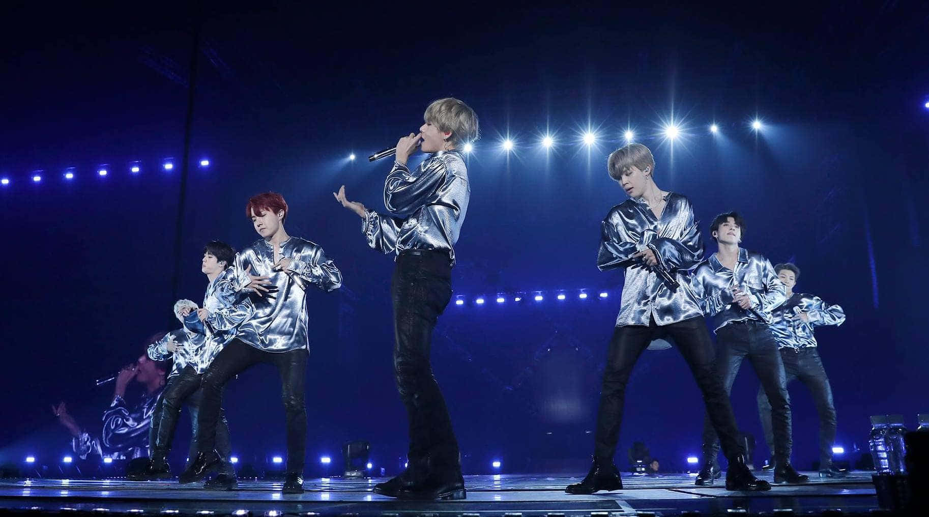 Bts Performing On Stage Wallpaper