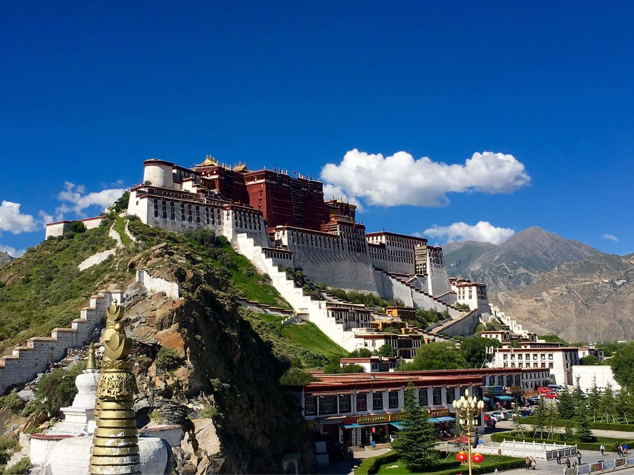 Building In Lhasa Situated Above The Mountain Wallpaper