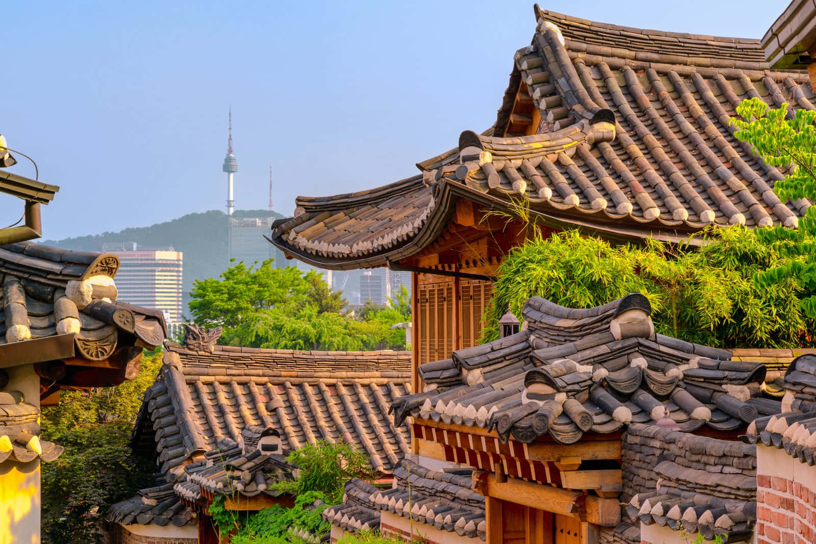 Bukchon Hanok Villagewith Seoul Tower Backdrop Wallpaper