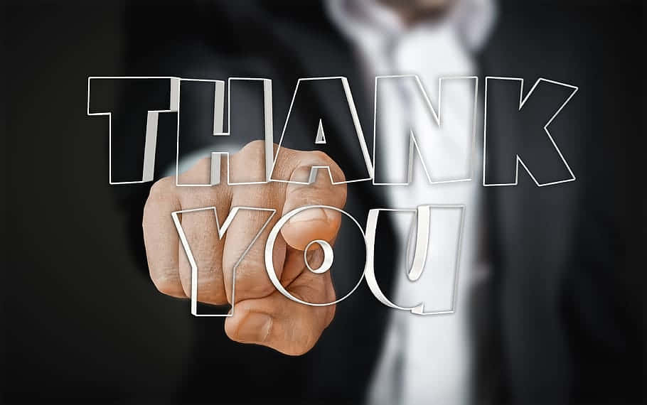 Businessman Expressing Gratitude Wallpaper