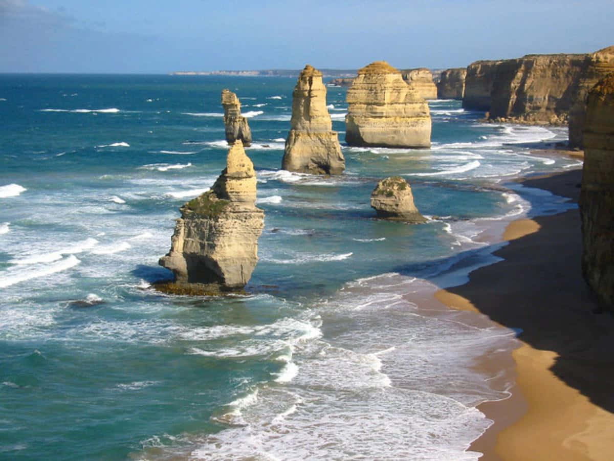 Buzzing Waves In Twelve Apostles In Victoria Australia Wallpaper