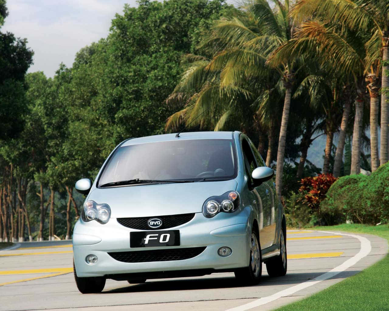 Byd Electric Vehicle On The Road Wallpaper