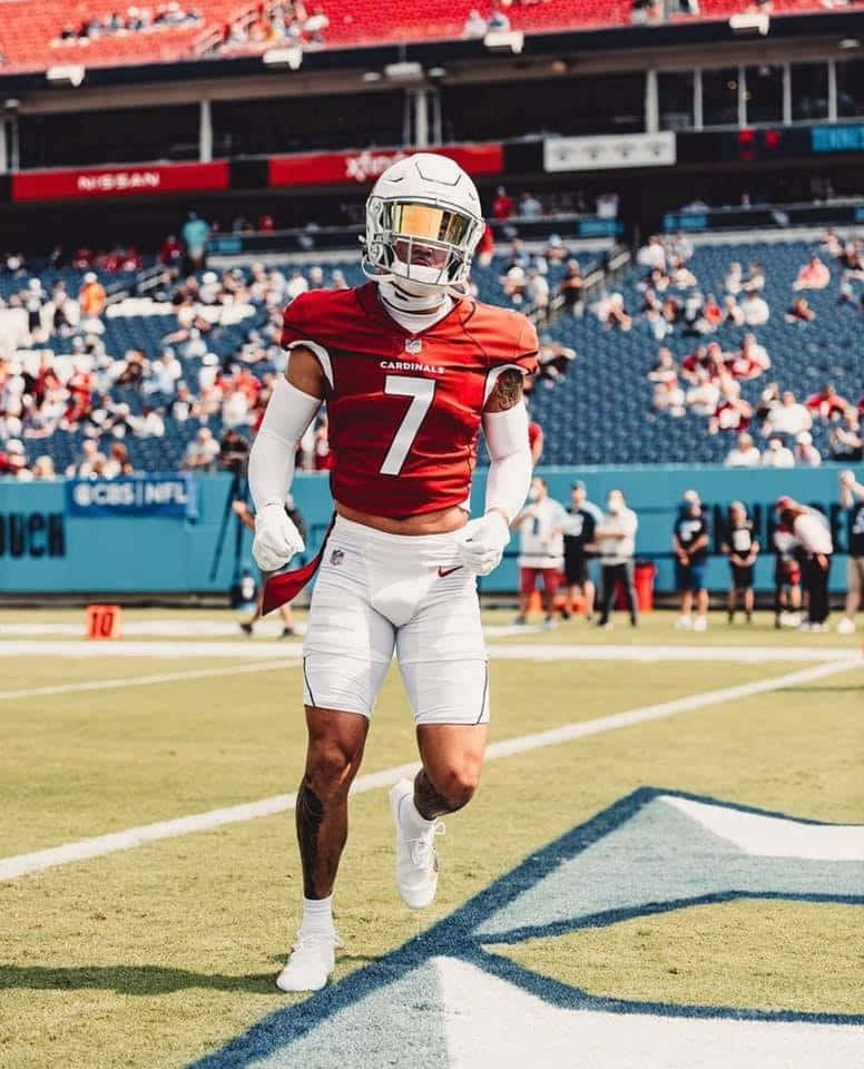 Byron Murphy In Action On The Football Field Wallpaper