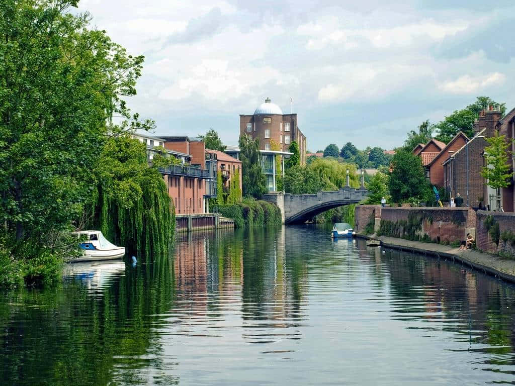 Calm Sunset Over Norwich Cityscape Wallpaper