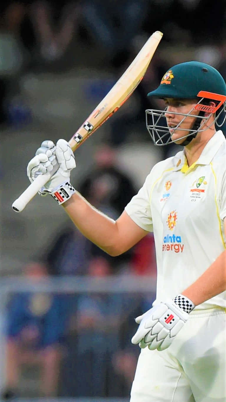 Cameron Green In Action On The Field During A Cricket Match Wallpaper